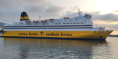 a large cruise ship sitting in the water at La Casa di Sonia in Savona