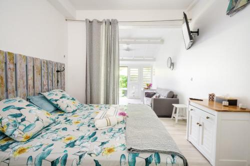 Voodi või voodid majutusasutuse Oasis de détente - Appartement Le Colibri Blanc toas