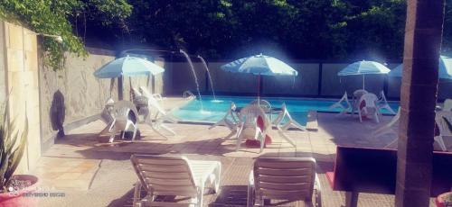 Bazén v ubytování Flats quase beira mar ar piscinas até 8 pessoas caseiro nebo v jeho okolí