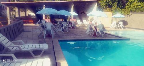 Bazén v ubytování Flats quase beira mar ar piscinas até 8 pessoas caseiro nebo v jeho okolí