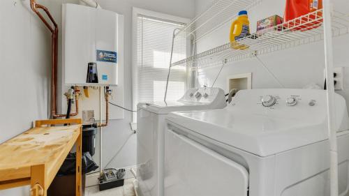 a kitchen with a white sink and a dishwasher at 414 E 17th Ave, 2nd Floor in North Wildwood