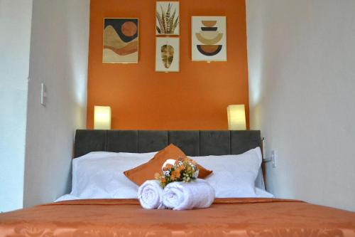 Cama ou camas em um quarto em Villa Manga Rosa