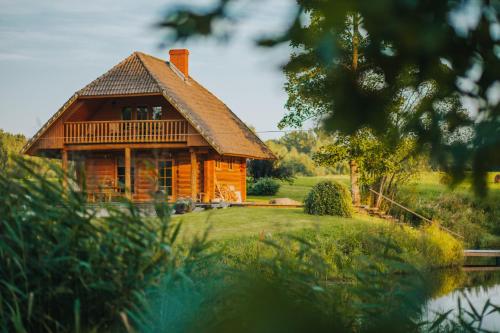 Taman di luar Brīvdienu māja ar pirti "Strautkalni"