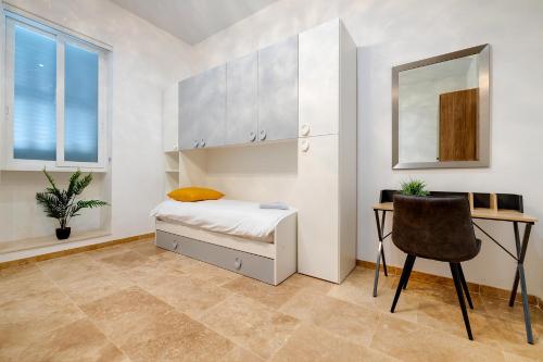 Postel nebo postele na pokoji v ubytování Top Location 1 Bedroom with Terrace