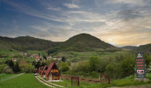 a small village in a valley with a mountain at Pyramid Energy House in Visoko
