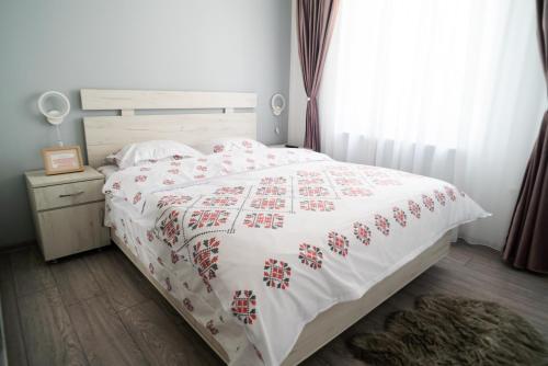 Katil atau katil-katil dalam bilik di Popasul Dacului Călător