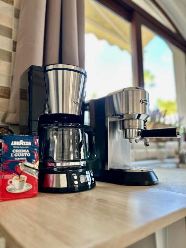 a blender sitting on top of a counter at Nicole Luxury Villas in Koskinou