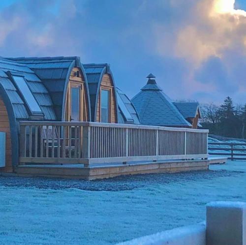 a rendering of a home with snow on the ground at Caithness View Luxury Farm Lodges and BBQ Huts in Wick