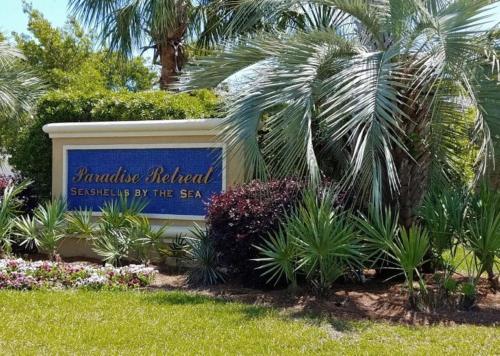 a sign for the flamingo hotel and casino by the sea at Beautiful Pet Friendly Home! Tropical Pool, Optional Golf Cart & Pool Heat, Minutes to Beach in Destin