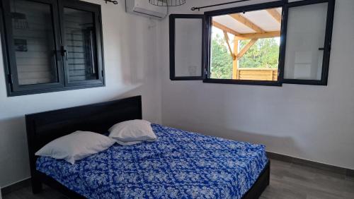 Postel nebo postele na pokoji v ubytování LES GITES D'ANGELE