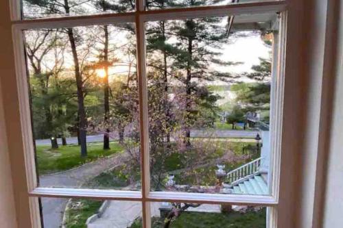 an open window with a view of a park at The Hillside B&B. Home w/ Breakfast Service! in Wisconsin Dells
