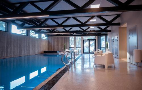 Πισίνα στο ή κοντά στο Cozy Apartment In Søgne With Sauna