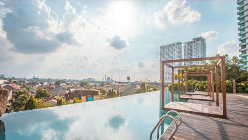 a swimming pool on top of a building at MM Property 