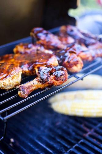 a bunch of food cooking on a grill at Magic House in Center in Chişinău