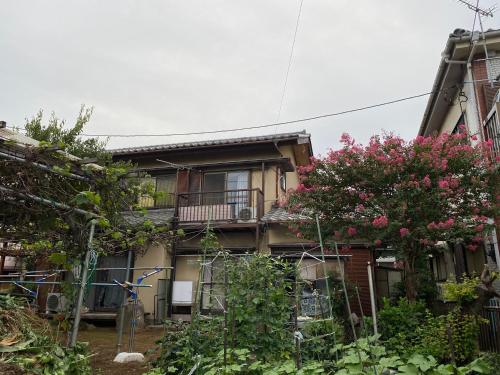 a building with a bunch of plants in front of it at "Cherry House" is Direct to Narita,Haneda AP, Disney, Asakusa, Skytree Tower, Tokyo in Matsudo