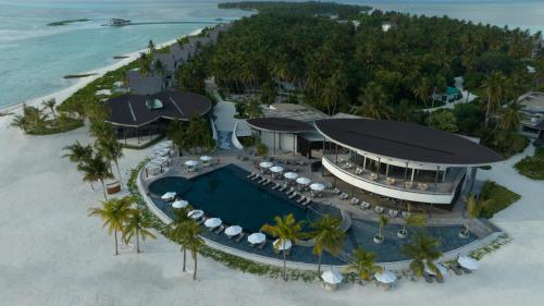 an aerial view of a resort on the beach at Madifushi Private Island in Meemu Atoll