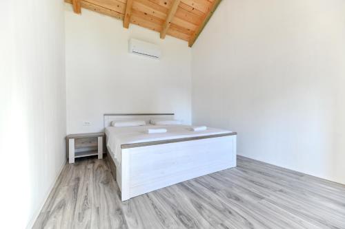 Katil atau katil-katil dalam bilik di Villa Martin