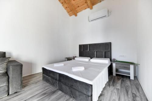 Katil atau katil-katil dalam bilik di Villa Martin