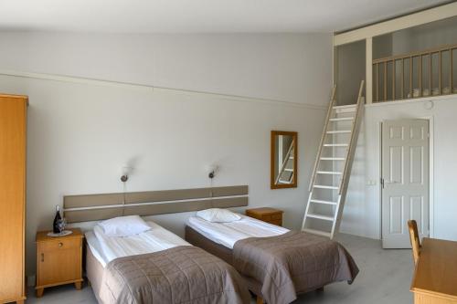 Postel nebo postele na pokoji v ubytování Spa Hotel Kasnäs