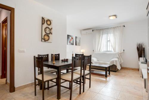 a dining room with a table and chairs at Vejer 1 - Andalmar in Vejer de la Frontera