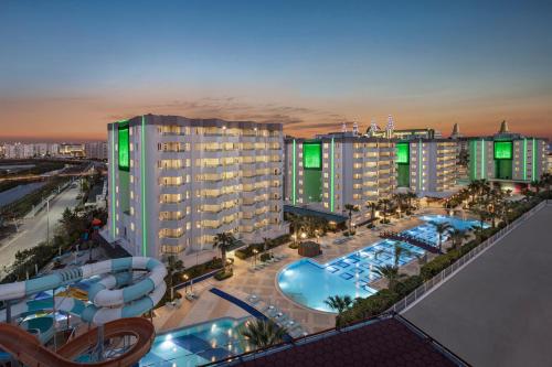 an aerial view of a hotel with a swimming pool at Wyndham Garden Lara in Lara