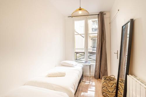 Posteľ alebo postele v izbe v ubytovaní 147 - Urban Cosy Flat in Paris