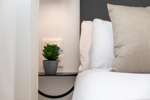 Katil atau katil-katil dalam bilik di Alidreams Lola Center Apartamentos
