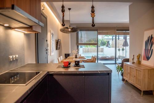 a kitchen with a large island in a room at Ambient Living in Preveza
