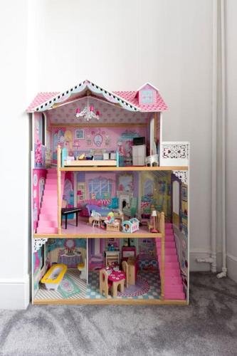 a doll house with a barbie at Lighthouse View - Apartment by the Sea in Margate