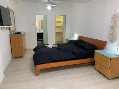 Una cama o camas en una habitación de הבית של אדם