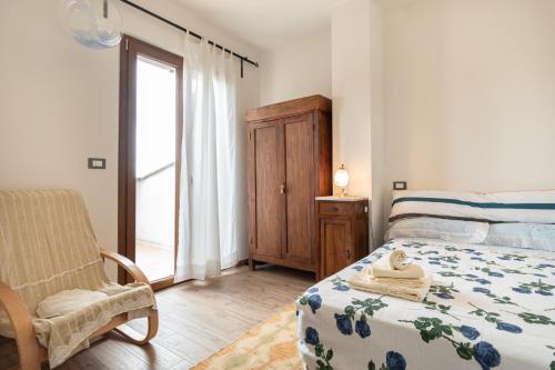 Ένα ή περισσότερα κρεβάτια σε δωμάτιο στο Casa Ester