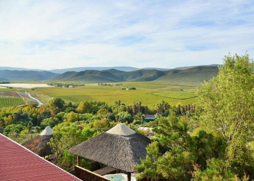 a view from the roof of a resort with mountains in the background at Avalon Springs by Dream Resorts in Montagu