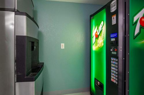 a green vending machine next to a green wall at Comfort Inn Beckley in Beckley