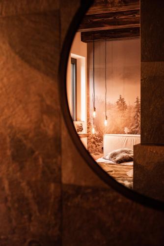 Ένα ή περισσότερα κρεβάτια σε δωμάτιο στο Le Chalet Skalite
