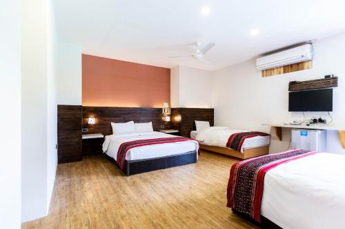 Postel nebo postele na pokoji v ubytování An Tong Hot Spring Hotel