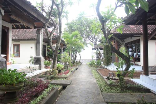 Zahrada ubytování Temple Cafe & Seaside Cottages