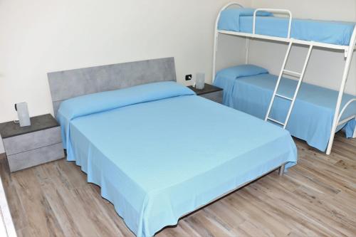 Postel nebo postele na pokoji v ubytování Incanto Salento House