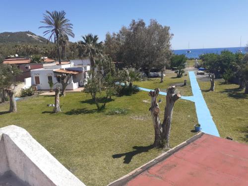 a view from the roof of a house with a park at Villetta Eoliana con piscina gratuita dall'11 Luglio al 31 Agosto in Vulcano