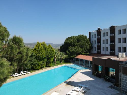 an image of a swimming pool at a hotel at Ephesus Hitit Hotel restaurant in Selçuk