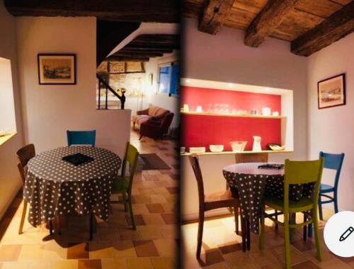 une chambre avec une table et des chaises ainsi qu'un salon dans l'établissement Maison centre historique Le Préau saint Jacques, à Castres