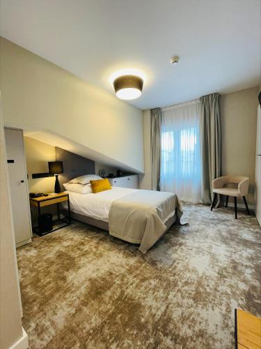 Postel nebo postele na pokoji v ubytování Hotel Wawel Queen