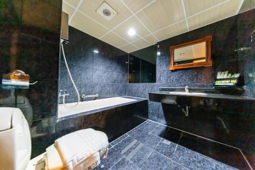 Koupelna v ubytování I HI Sanduo Travel Hotel