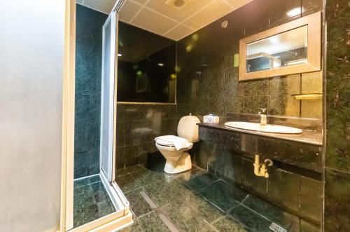 Koupelna v ubytování I HI Sanduo Travel Hotel