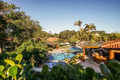 布希奧斯的住宿－考賴斯康查斯酒店，度假村游泳池的图片