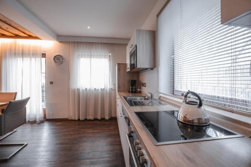 Η κουζίνα ή μικρή κουζίνα στο Chalet Alpenstern