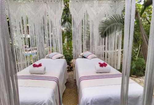 Ένα ή περισσότερα κρεβάτια σε δωμάτιο στο Hotel Hulku