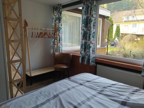 Postel nebo postele na pokoji v ubytování Pension Haus Sonneck