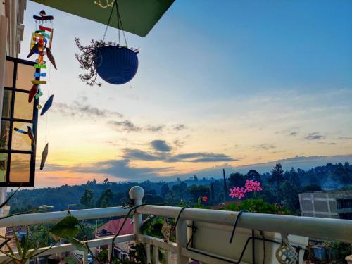 a balcony with a view of the mountains at Modern & Comfy Mt. Kenya Sunset View Apartment in Kangaru