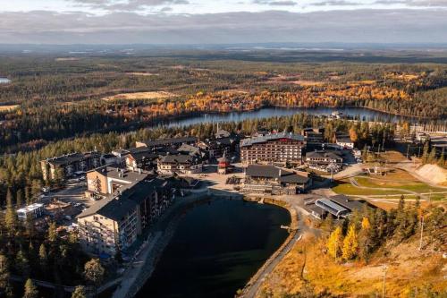 an aerial view of a resort next to a lake at Ruka Chalet Front Base in Ruka