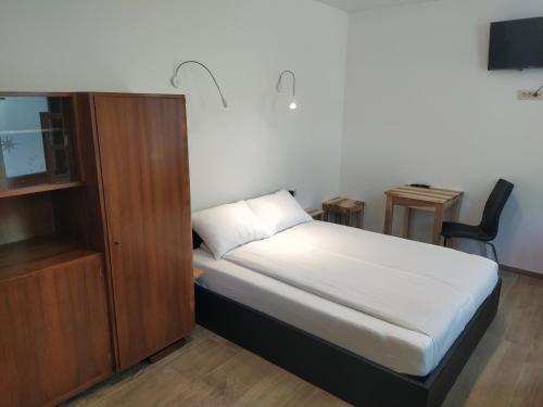 Postel nebo postele na pokoji v ubytování Apartmaji Maln